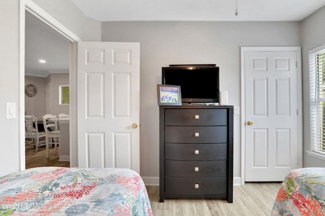 1800 The Greens Way Unit 605, Jacksonville Beach, FL 32250 - bedroom with light wood finished floors