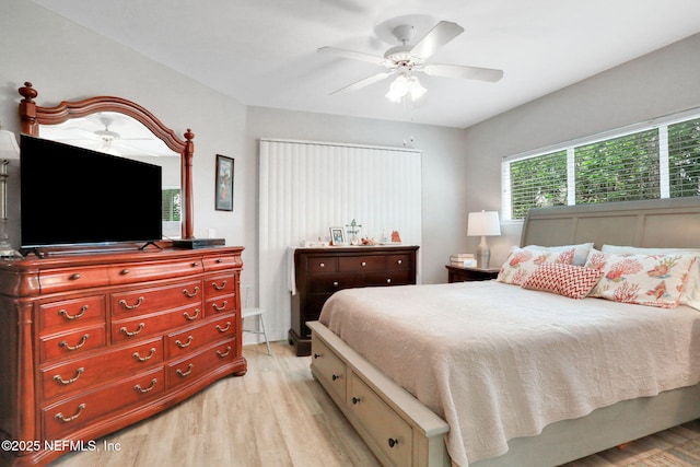 1800 The Greens Way Unit 605, Jacksonville Beach, FL 32250 - bedroom with light wood finished floors and a ceiling fan