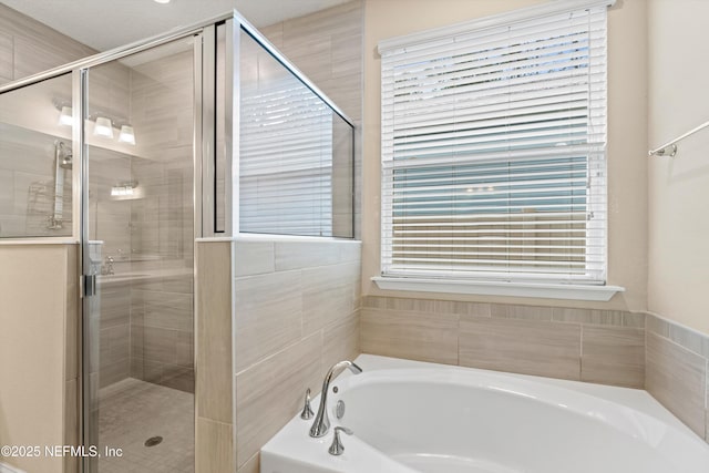 3024 Las Calinas Blvd, Saint Augustine, FL 32095 - full bathroom with a bath, a stall shower, and healthy amount of natural light