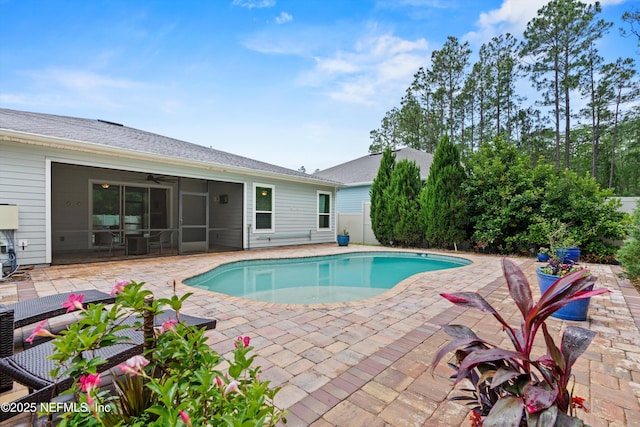 3024 Las Calinas Blvd, Saint Augustine, FL 32095 - outdoor pool with a patio area, a sunroom, and a ceiling fan