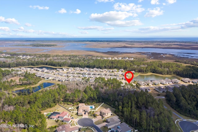 3024 Las Calinas Blvd, Saint Augustine, FL 32095 - aerial view of property and surrounding area featuring a large body of water and nearby suburban area