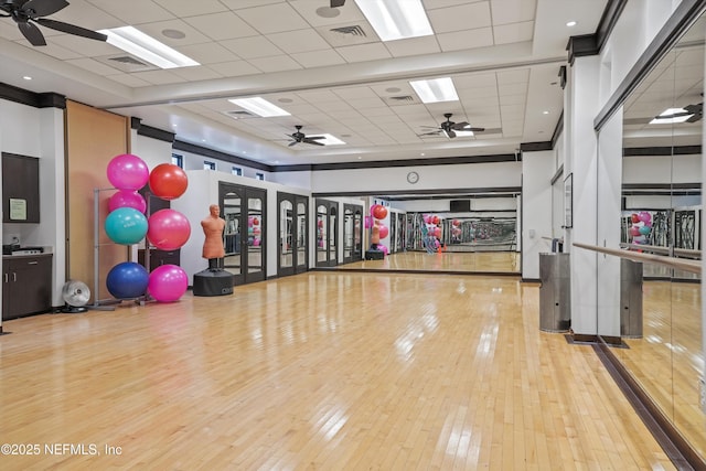 3024 Las Calinas Blvd, Saint Augustine, FL 32095 - exercise room with ceiling fan, wood-type flooring, and a drop ceiling