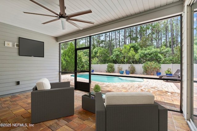 3024 Las Calinas Blvd, Saint Augustine, FL 32095 - view of swimming pool featuring a patio area, a ceiling fan, and a fenced backyard