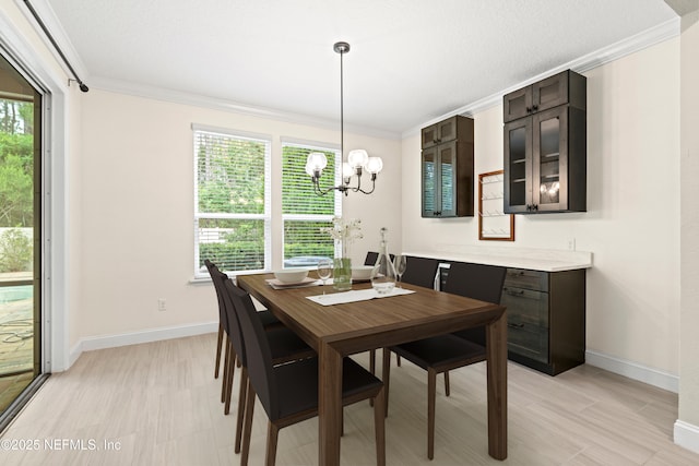 3024 Las Calinas Blvd, Saint Augustine, FL 32095 - dining area featuring a chandelier and crown molding