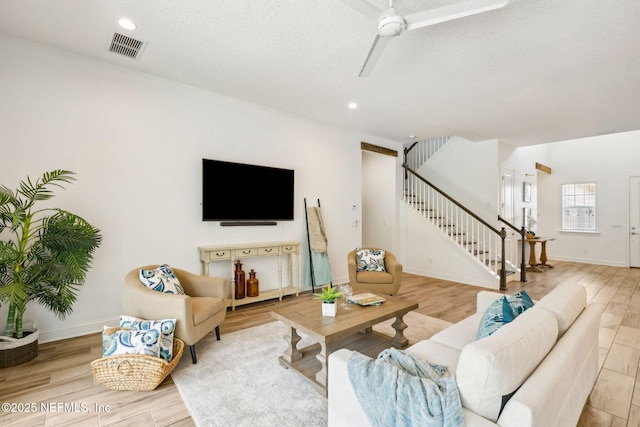 21 Mollusk Rd, Saint Johns, FL 32259 - living area with stairway, a ceiling fan, wood finished floors, and recessed lighting