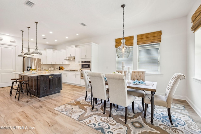 21 Mollusk Rd, Saint Johns, FL 32259 - dining room featuring light wood finished floors and recessed lighting