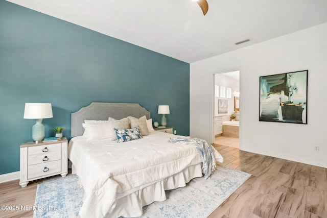 21 Mollusk Rd, Saint Johns, FL 32259 - bedroom with light wood-style floors and connected bathroom
