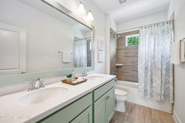 21 Mollusk Rd, Saint Johns, FL 32259 - bathroom featuring double vanity, shower / tub combo with curtain, and wood finished floors