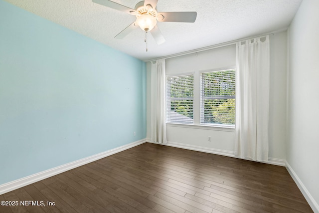 21 Mollusk Rd, Saint Johns, FL 32259 - empty room with dark wood-type flooring, a textured ceiling, and ceiling fan