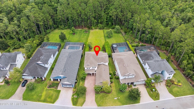 21 Mollusk Rd, Saint Johns, FL 32259 - aerial view of residential area with a forest