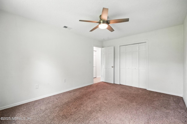 2181 Glenwood Hammock Rd, Deland, FL 32720 - unfurnished bedroom with carpet floors, a closet, and ceiling fan
