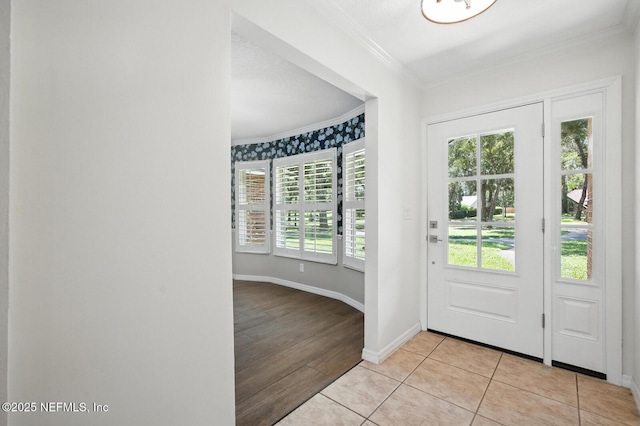 2181 Glenwood Hammock Rd, Deland, FL 32720 - entrance foyer with crown molding and light tile patterned floors