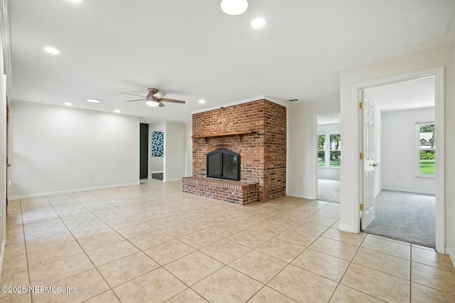2181 Glenwood Hammock Rd, Deland, FL 32720 - unfurnished living room featuring light tile patterned floors, ceiling fan, plenty of natural light, recessed lighting, and a fireplace
