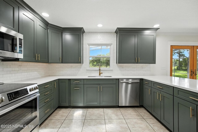 2181 Glenwood Hammock Rd, Deland, FL 32720 - kitchen with appliances with stainless steel finishes, light countertops, backsplash, ornamental molding, and light tile patterned floors