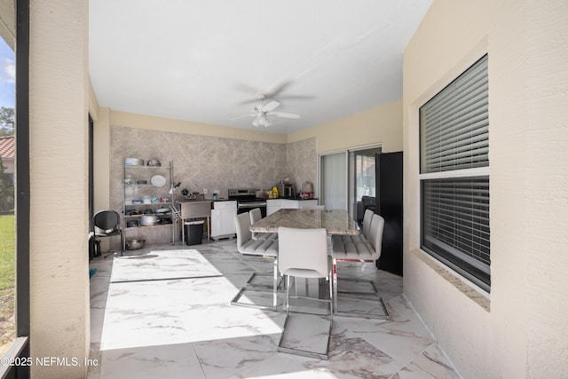 8 Village Cir, Palm Coast, FL 32164 - view of patio with ceiling fan, exterior kitchen, and outdoor dining space