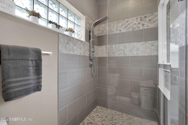 1571 Shelter Cove Dr, Fleming Island, FL 32003 - bathroom featuring a tile shower
