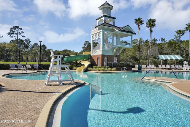 1571 Shelter Cove Dr, Fleming Island, FL 32003 - community pool with a water slide and a patio area