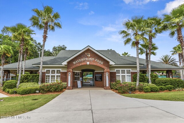 1571 Shelter Cove Dr, Fleming Island, FL 32003 - view of building exterior with concrete driveway