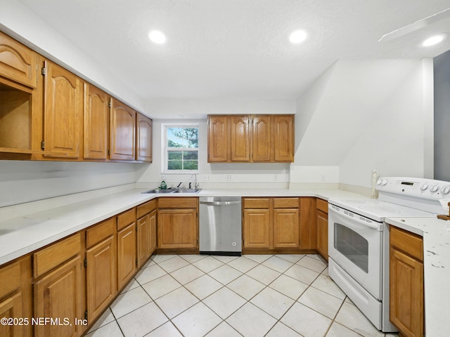 150 Calle Menendez, Saint Augustine, FL 32086 - kitchen with dishwasher, electric stove, light countertops, brown cabinets, and recessed lighting