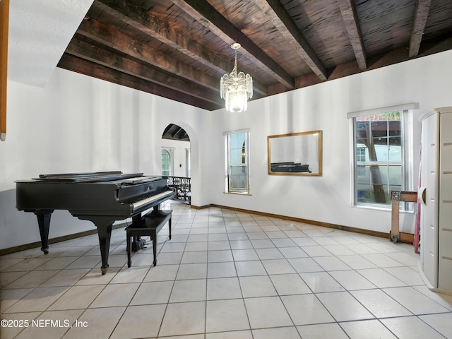 150 Calle Menendez, Saint Augustine, FL 32086 - sitting room featuring a wooden ceiling with exposed beams, arched walkways, a chandelier, and light tile patterned floors