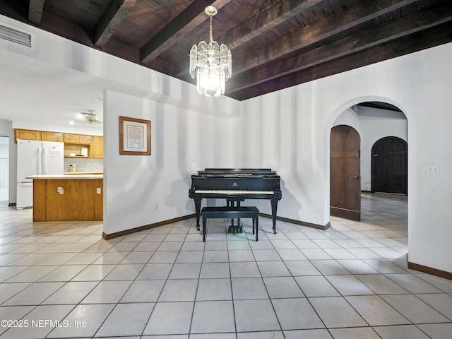 150 Calle Menendez, Saint Augustine, FL 32086 - living area featuring a wooden ceiling with exposed beams, light tile patterned floors, arched walkways, a chandelier, and a ceiling fan