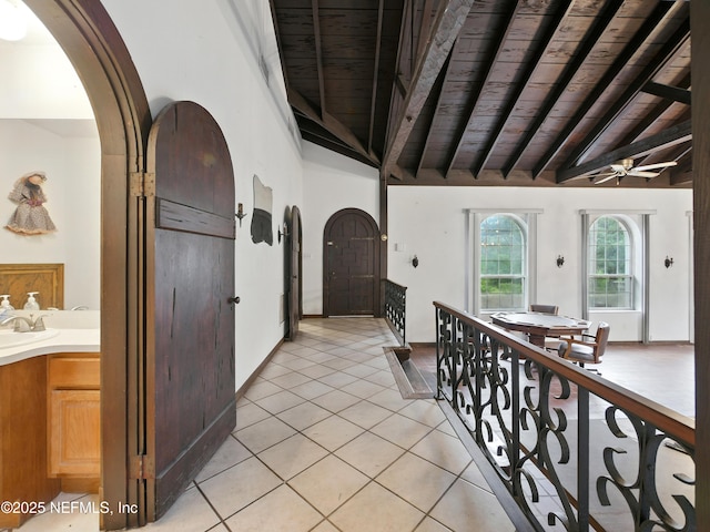 150 Calle Menendez, Saint Augustine, FL 32086 - corridor featuring wooden ceiling, light tile patterned flooring, and arched walkways