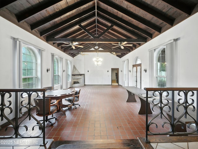 150 Calle Menendez, Saint Augustine, FL 32086 - interior space with a wood ceiling with exposed beams, healthy amount of natural light, high vaulted ceiling, a ceiling fan, and a chandelier