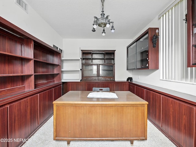 150 Calle Menendez, Saint Augustine, FL 32086 - home office with a chandelier and light carpet