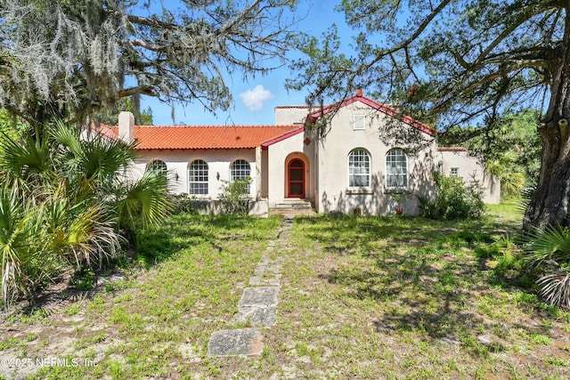 150 Calle Menendez, Saint Augustine, FL 32086 - mediterranean / spanish house with a tile roof and stucco siding