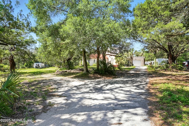 150 Calle Menendez, Saint Augustine, FL 32086 - view of front of house with a garage and driveway
