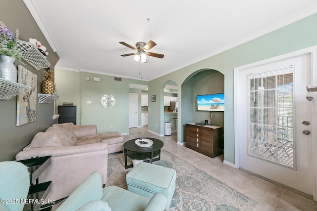 10075 Gate Pkwy N Unit 913, Jacksonville, FL 32246 - living area featuring a ceiling fan, light tile patterned flooring, ornamental molding, and arched walkways