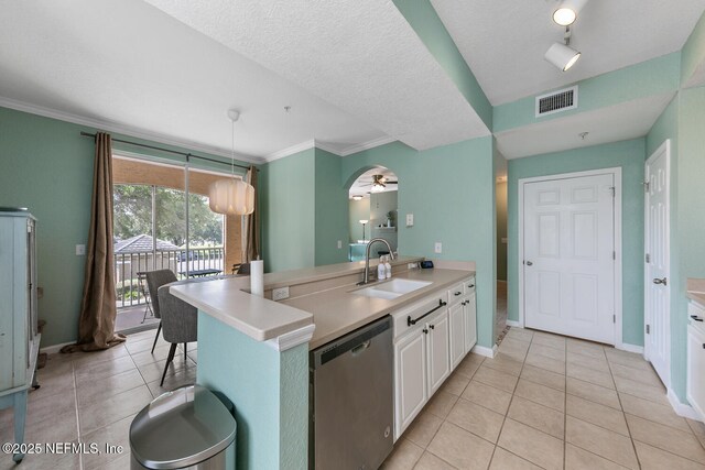 10075 Gate Pkwy N Unit 913, Jacksonville, FL 32246 - kitchen with stainless steel dishwasher, light tile patterned flooring, white cabinetry, light countertops, and ornamental molding