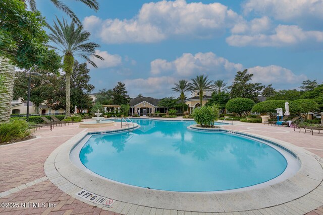 10075 Gate Pkwy N Unit 913, Jacksonville, FL 32246 - community pool with a patio