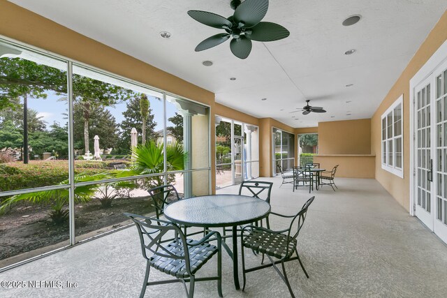 10075 Gate Pkwy N Unit 913, Jacksonville, FL 32246 - sunroom featuring outdoor dining space, a ceiling fan, and healthy amount of natural light