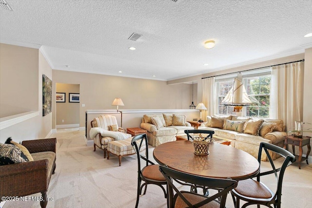 4705 Sawbuck St, Saint Augustine, FL 32092 - dining space with ornamental molding, light colored carpet, recessed lighting, and a textured ceiling