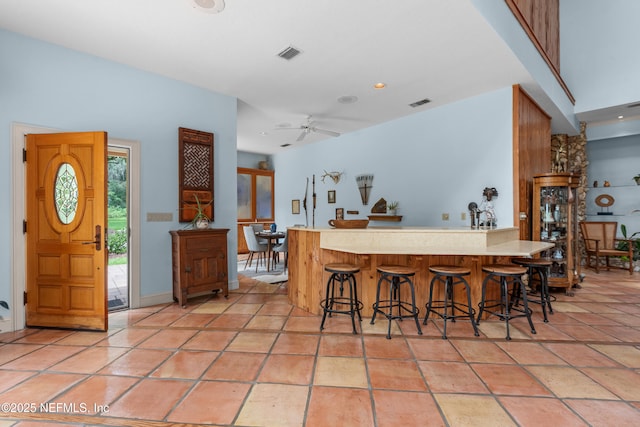 970 Fruit Cove Rd, Saint Johns, FL 32259 - kitchen with ceiling fan, a kitchen breakfast bar, light countertops, a peninsula, and recessed lighting