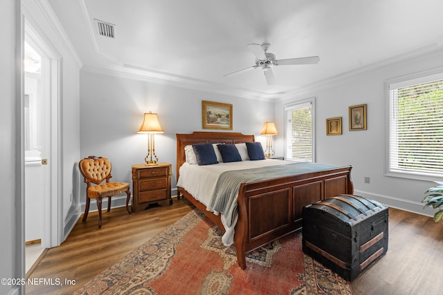 970 Fruit Cove Rd, Saint Johns, FL 32259 - bedroom with wood finished floors, ornamental molding, and a ceiling fan