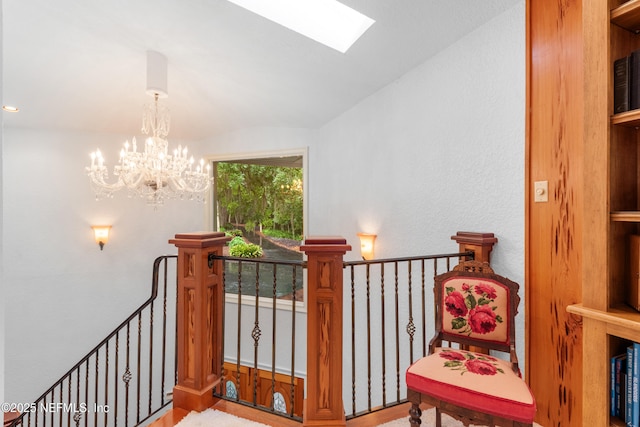 970 Fruit Cove Rd, Saint Johns, FL 32259 - staircase with a chandelier, vaulted ceiling, wood finished floors, and a skylight
