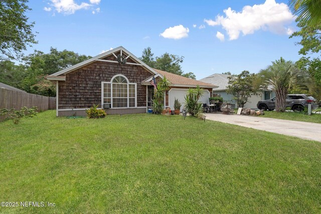 1942 Calusa Trl, Middleburg, FL 32068 - view of front of house with driveway and an attached garage
