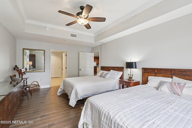 1478 Riverplace Blvd Unit 1605, Jacksonville, FL 32207 - bedroom with a tray ceiling, wood finished floors, crown molding, and ceiling fan