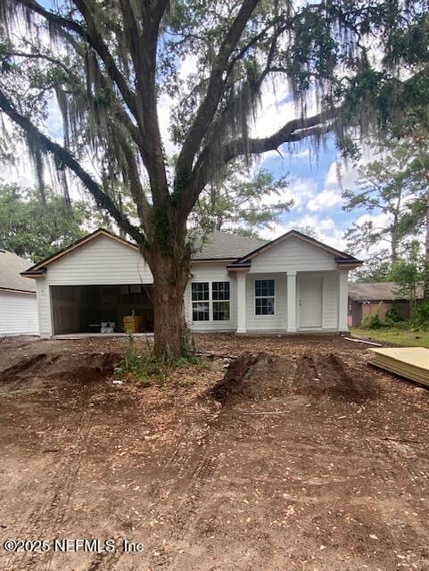 9021 Noroad, Jacksonville, FL 32210 - ranch-style house with a garage