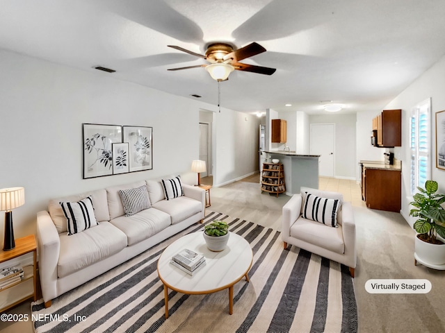 287 Buck Run Way, Saint Augustine, FL 32092 - living area featuring a ceiling fan and light carpet