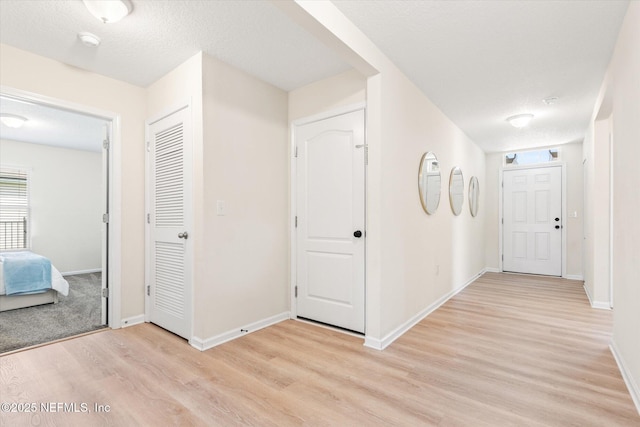189 Blue Creek Way, Saint Augustine, FL 32086 - hallway featuring light wood-style floors and baseboards