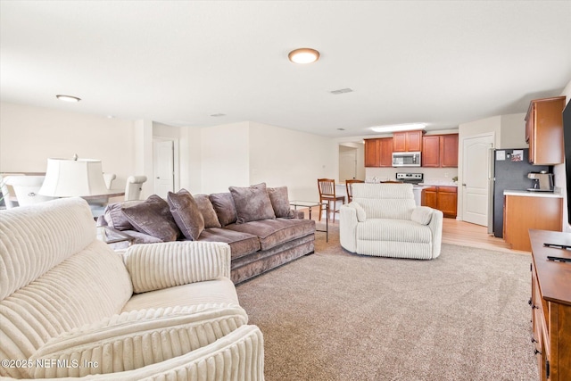 189 Blue Creek Way, Saint Augustine, FL 32086 - living area featuring light colored carpet