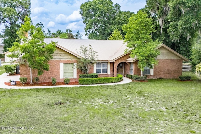 361 SE 34th St, Keystone Heights, FL 32656 - ranch-style home with a front lawn and brick siding