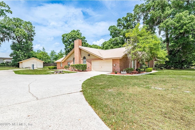 361 SE 34th St, Keystone Heights, FL 32656 - view of front of property with brick siding, a chimney, a front yard, and driveway