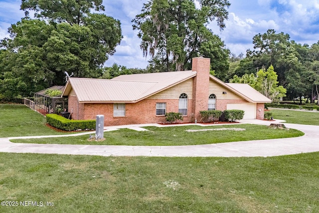 361 SE 34th St, Keystone Heights, FL 32656 - view of front of house with brick siding, a front yard, and a chimney