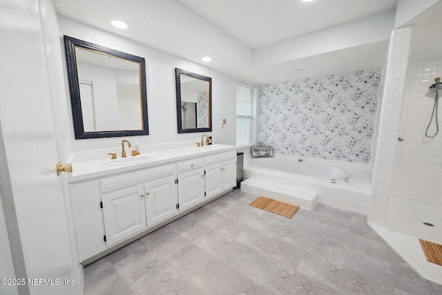361 SE 34th St, Keystone Heights, FL 32656 - bathroom featuring double vanity, a bath, recessed lighting, and tiled shower