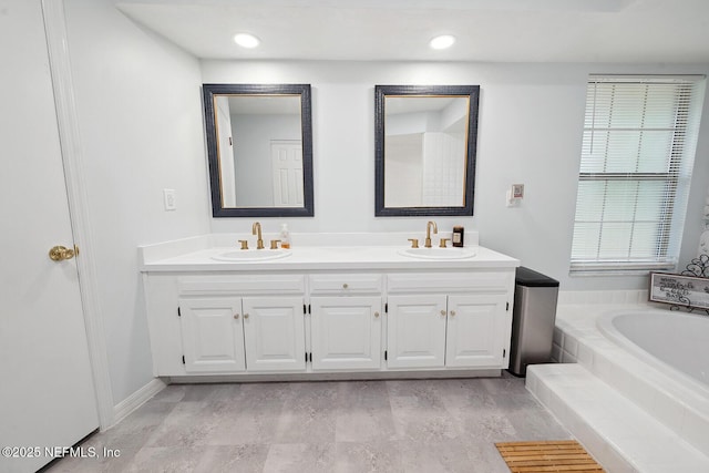 361 SE 34th St, Keystone Heights, FL 32656 - bathroom with double vanity and a garden tub