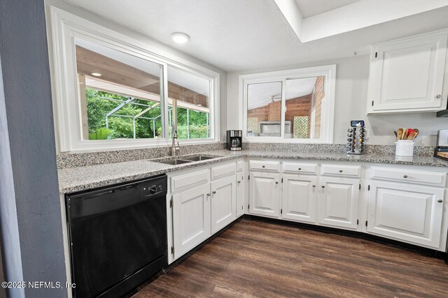 361 SE 34th St, Keystone Heights, FL 32656 - kitchen with dishwasher, white cabinets, light stone counters, and dark wood-style flooring